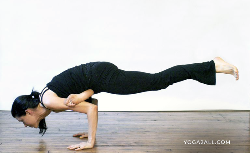 What Is Flying Crow Pose And What Are Its Benefits